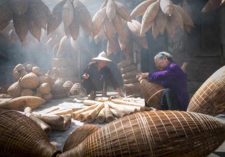 Making fish trap baskets in Thu Sy village