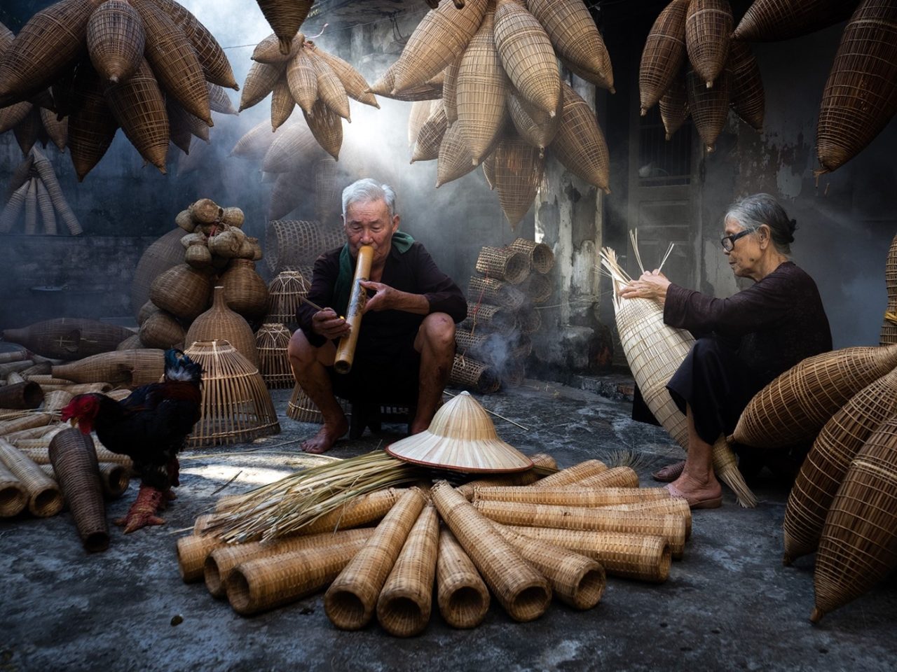 Making fish trap baskets in Thu Sy village